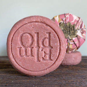 Pink Shampoo Bar made for everyone by a licenced hairstylist, wrapped in pink marbled paper.